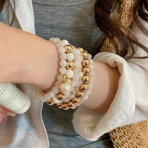 Elegant multi-layer acrylic pearl and gold beaded bracelet set for women boho chic style