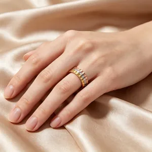 Detailed view of three-tone industrial gear style stainless steel ring on model hand