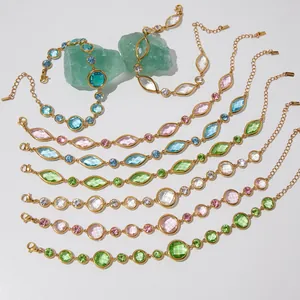 Elegante goudvergulde roestvrijstalen armbanden met gekleurde kristallen en edelstenen