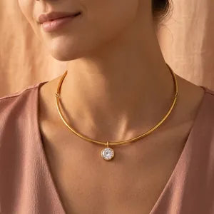 Elegant 18K gold-plated stainless steel choker with a sparkling round zircon pendant.