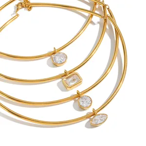 Gold plated stainless steel chokers with round and marquise crystal pendants