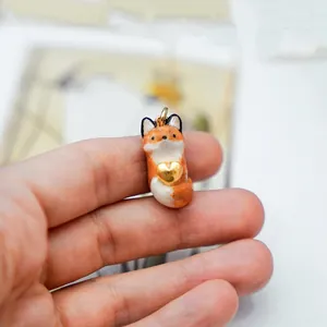 Adorable handmade fox pendant with a golden heart charm, cute animal jewelry for gifts