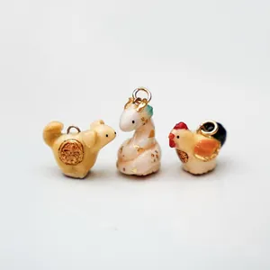 Handcrafted miniature ceramic animal charms puppy giraffe rooster for jewelry making