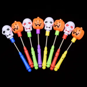 Halloween LED φωτεινές ράβδοι με ελατήριο, σχέδια νεκροκεφαλής και κολοκύθας για παιδιά.