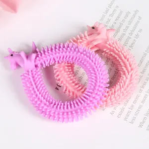 Detailed view of textured unicorn sensory fidget bracelets in soft purple and pink colors