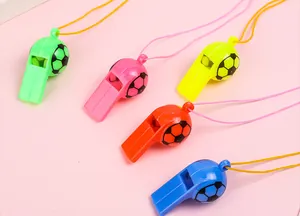 Detailed view showing five colorful plastic football whistles with matching neck lanyards.