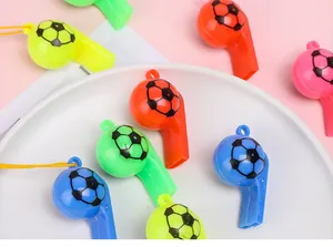 Close-up detail of colorful soccer ball whistles with yellow lanyards for cheering