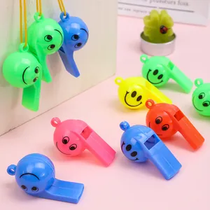 Colorful plastic smiley face whistles with yellow lanyards for cheerleading and sports