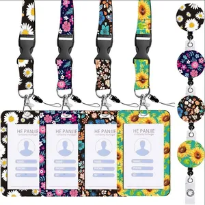 Detailed view of floral print ID card holder set with matching lanyard and badge reel