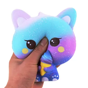 Close-up of galaxy cat squishy being squeezed to show slow rebound texture and design