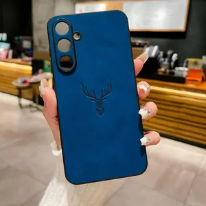Detail showing navy blue faux lambskin phone case with embossed deer head for Samsung Galaxy.