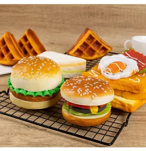 Detailed view of various realistic PU simulation food models like burgers and toast