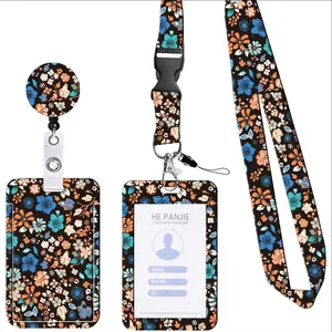 Detailed view of floral print lanyard set with retractable badge reel and ID holder