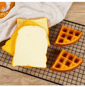 Detailed view of realistic PU foam toast slices and waffle models for food photography props