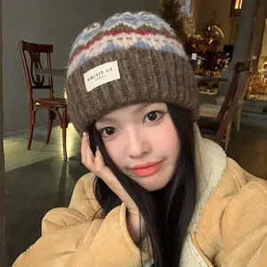 Vintage Fair Isle knit beanie hat for women in warm brown with soft winter fleece lining
