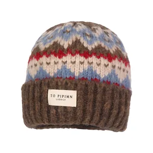 Vintage Fair Isle patterned knit beanie for women in brown and blue warm winter wool