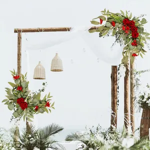 Detail view of artificial red rose floral arrangement for wedding arch decoration