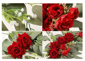 Close-up details of artificial red roses and eucalyptus leaves for wedding decoration.