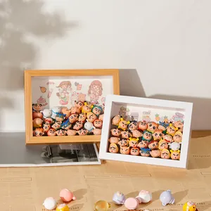 Detail macro view of 3D hollow wooden display frame used for storing small cartoon figurines