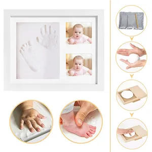 White baby hand and footprint keepsake frame kit with clay for DIY nursery memorial decor