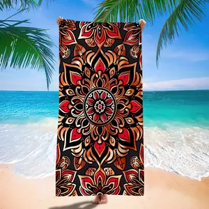 Detailed view of microfiber quick-dry beach towel with vibrant mandala pattern print