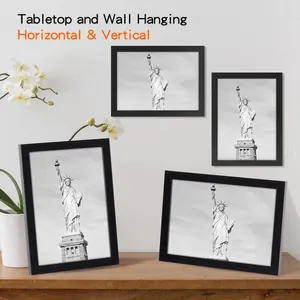 Set of black wooden photo frames showing tabletop and wall hanging utility