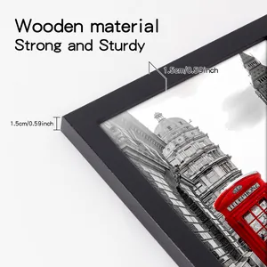 Detail view of the 1.5cm sturdy black wooden picture frame showing edge thickness