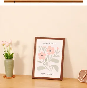 Detailed view of the wooden picture frame featuring a botanical floral market art print