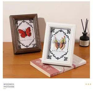 Detailed view of 3D wooden butterfly specimen display frames with glass