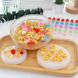 Detailed view of DIY silicone molds for making realistic cereal and gummy bear candles