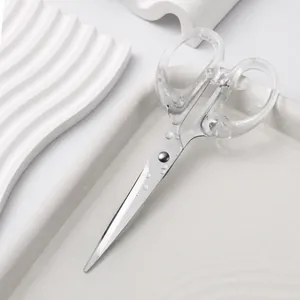 Minimalistische Schere mit transparentem Griff und rostfreier Edelstahlklinge