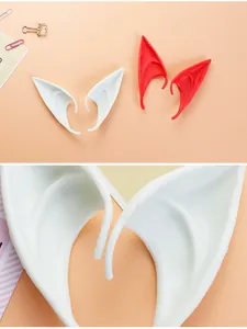 Macro detail view of white soft latex elf ears for Halloween and fairy cosplay costumes