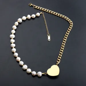 Close-up detail of golden heart pendant and natural freshwater pearl stitching necklace