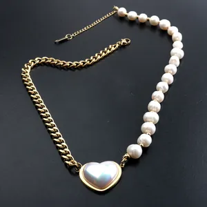 Elegant spliced freshwater pearl and gold chain necklace with iridescent heart pendant