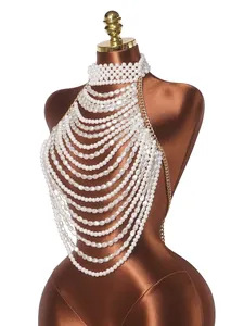 Detailed close-up view of an elegant multi-layer pearl halter body chain on a mannequin