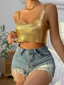 Detailed shot of a gold metallic mesh sequin camisole top with shiny texture