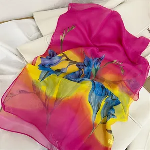 Vibrant floral chiffon scarf with magenta and yellow gradient details