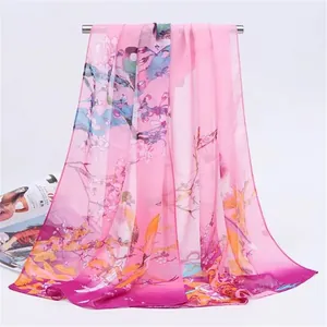 Elegant long pink chiffon scarf featuring a traditional magpie and plum blossom print