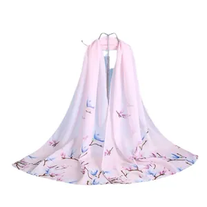 Elegant pink chiffon long scarf with delicate blue floral print on white background