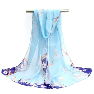 Light blue chiffon long scarf with white plum blossom floral print.