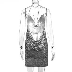 Detailed back view of a sexy silver leopard print metallic mesh halter mini party dress