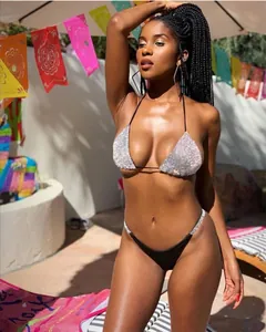 Two-piece sexy silver glitter bikini set with black bottoms for summer beach vacations