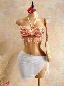 Bohemian handmade beaded halter bandeau top with tassels on mannequin for beachwear