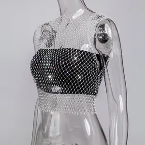 Close-up detail of sexy silver rhinestone fishnet vest top with sparkling accents