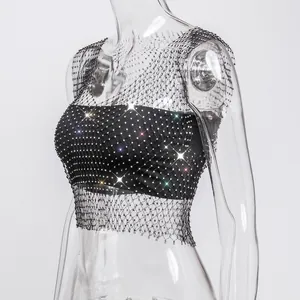 Close-up detail of sparkling rhinestones on black fishnet sleeveless elastic crop top vest