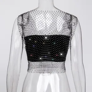 Close-up of sexy black fishnet tank top with sparkling rhinestones detail