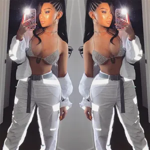 Reflective silver streetwear set with high waist pants and cropped jacket detail