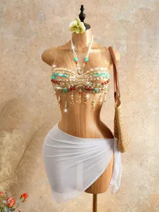 Bohemian beaded halter top with tassels on mannequin for beach vacation style.