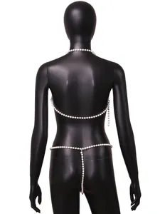 Detailed back view of a sexy white pearl body chain bikini set on black mannequin.