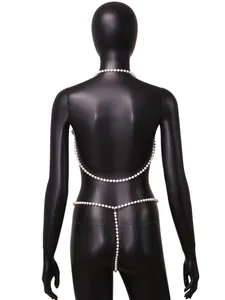 Back view of a sexy white pearl body chain set on a black mannequin for detail